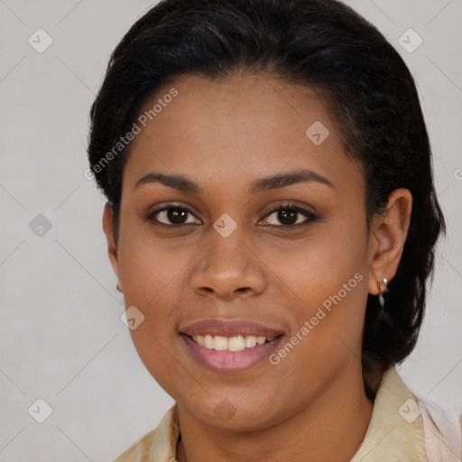 Joyful black young-adult female with medium  brown hair and brown eyes