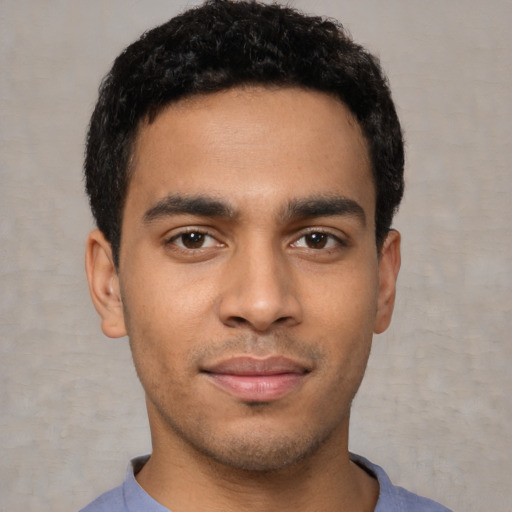 Neutral latino young-adult male with short  brown hair and brown eyes