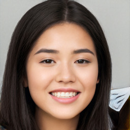 Joyful white young-adult female with long  black hair and brown eyes
