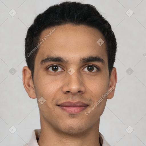 Joyful latino young-adult male with short  black hair and brown eyes