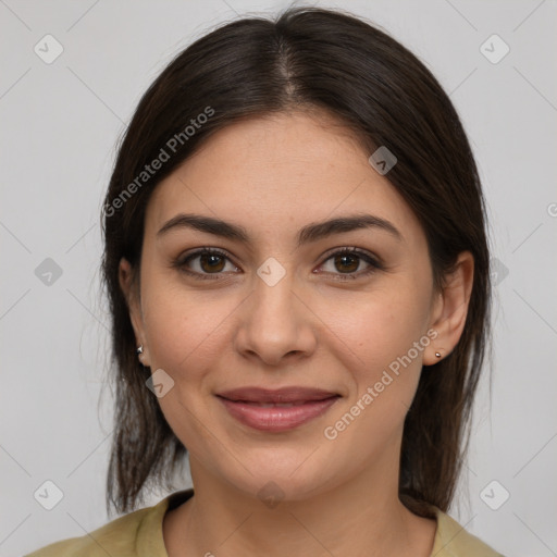 Joyful white young-adult female with medium  brown hair and brown eyes