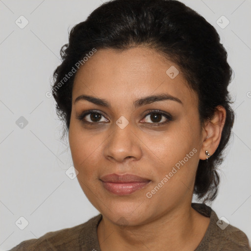 Joyful latino young-adult female with short  brown hair and brown eyes