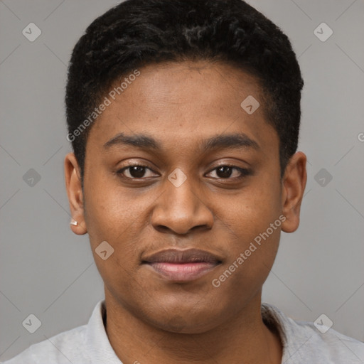 Joyful black young-adult male with short  brown hair and brown eyes