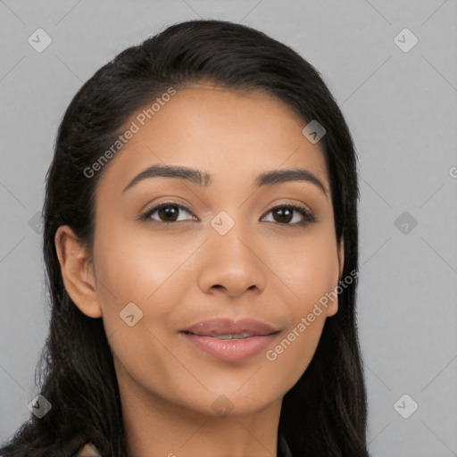 Joyful latino young-adult female with long  black hair and brown eyes