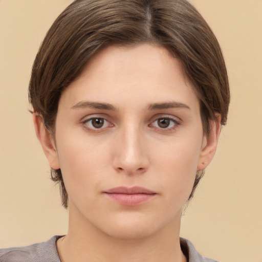 Neutral white young-adult female with short  brown hair and brown eyes