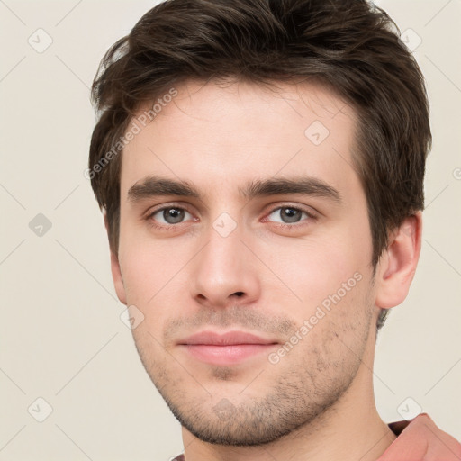 Neutral white young-adult male with short  brown hair and grey eyes