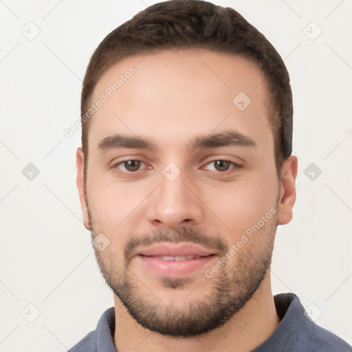 Neutral white young-adult male with short  brown hair and brown eyes