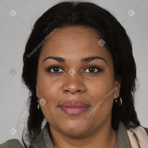 Joyful black adult female with medium  brown hair and brown eyes