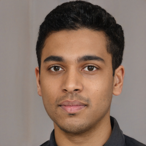 Neutral latino young-adult male with short  black hair and brown eyes