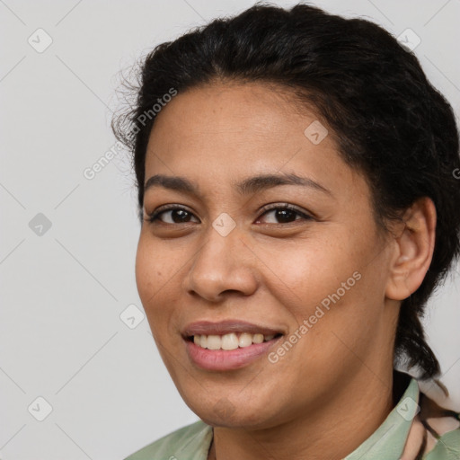 Joyful latino young-adult female with short  brown hair and brown eyes