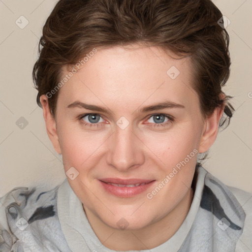 Joyful white young-adult female with medium  brown hair and blue eyes