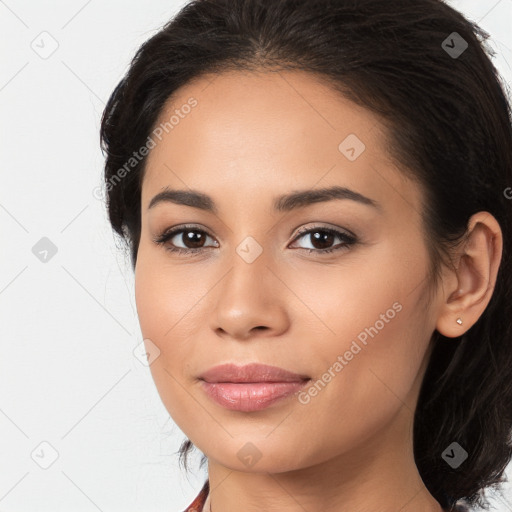 Joyful latino young-adult female with long  brown hair and brown eyes