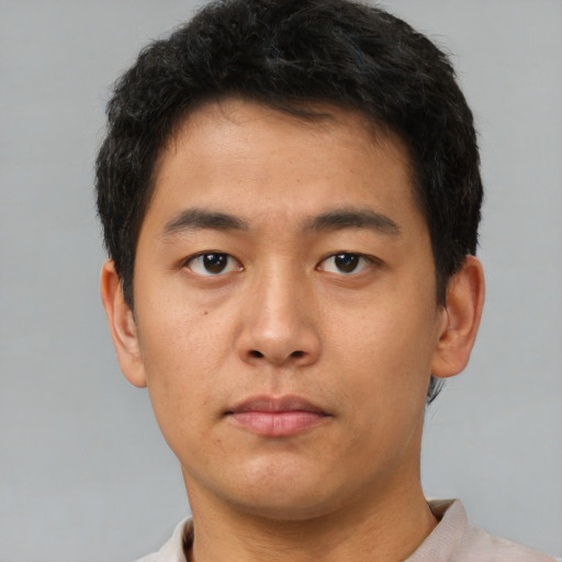 Neutral asian young-adult male with short  brown hair and brown eyes