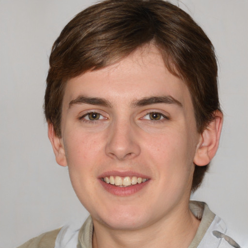 Joyful white young-adult male with medium  brown hair and brown eyes