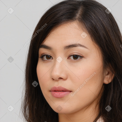 Neutral white young-adult female with long  brown hair and brown eyes