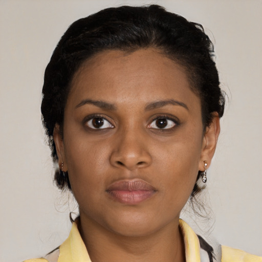 Neutral latino young-adult female with medium  brown hair and brown eyes