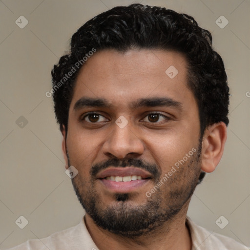 Joyful latino young-adult male with short  black hair and brown eyes