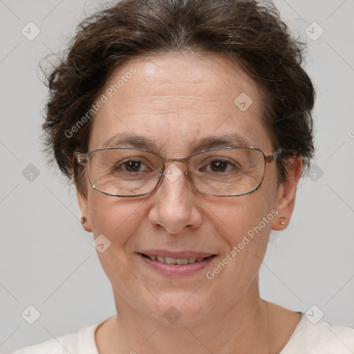 Joyful white adult female with short  brown hair and brown eyes