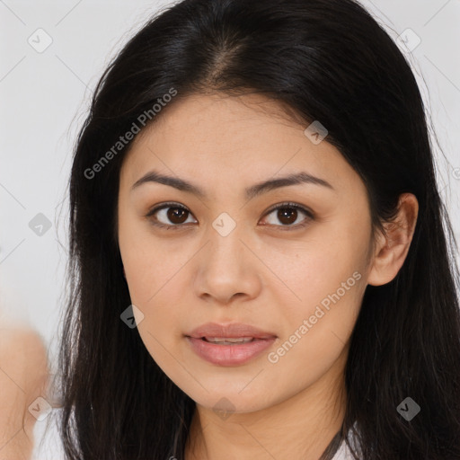 Joyful asian young-adult female with long  brown hair and brown eyes