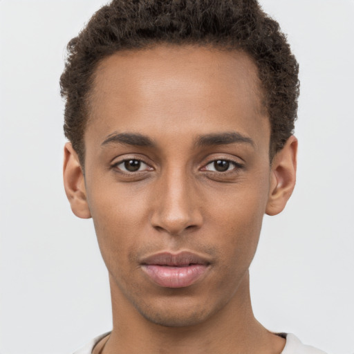 Neutral black young-adult male with short  brown hair and brown eyes