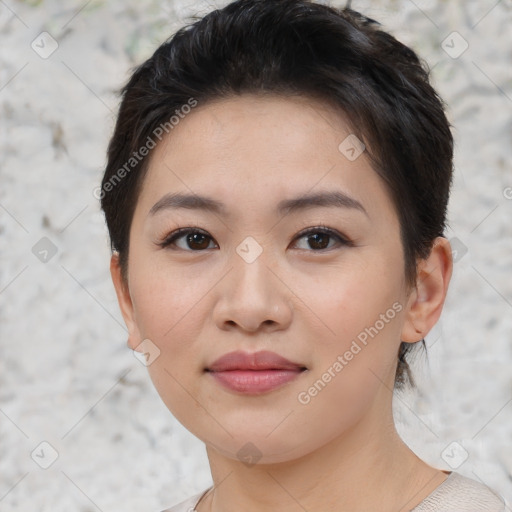 Joyful asian young-adult female with short  brown hair and brown eyes