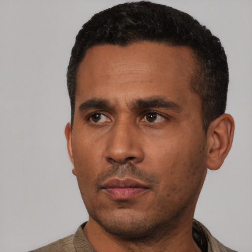 Neutral latino adult male with short  black hair and brown eyes