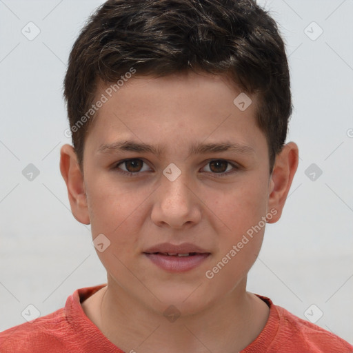 Joyful white child male with short  brown hair and brown eyes