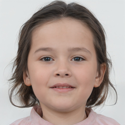 Joyful white child female with medium  brown hair and brown eyes