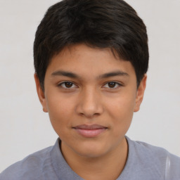 Joyful latino young-adult male with short  brown hair and brown eyes