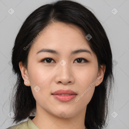 Joyful asian young-adult female with medium  black hair and brown eyes