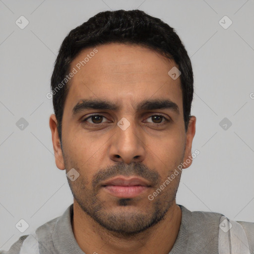 Neutral latino young-adult male with short  black hair and brown eyes