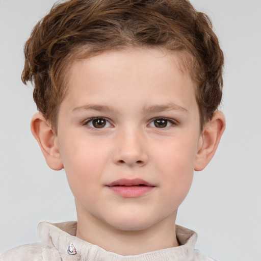 Joyful white child male with short  brown hair and brown eyes