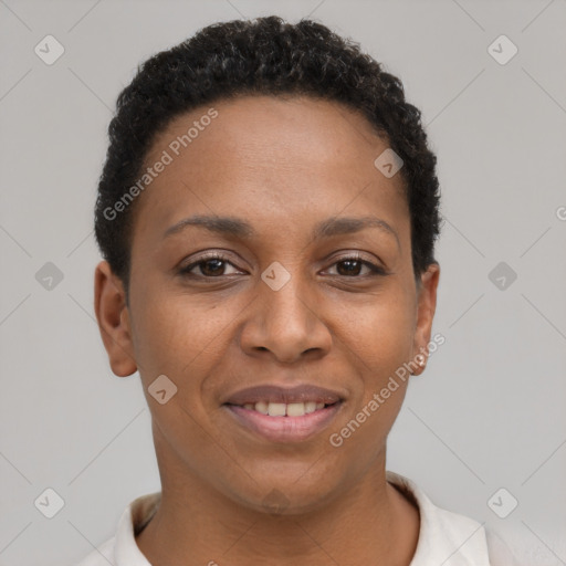 Joyful black young-adult female with short  brown hair and brown eyes