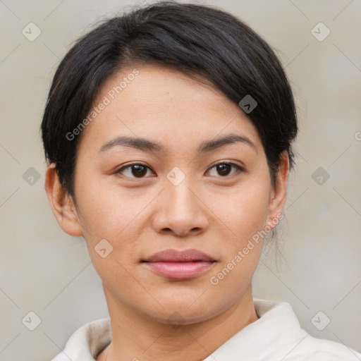 Joyful asian young-adult female with short  brown hair and brown eyes