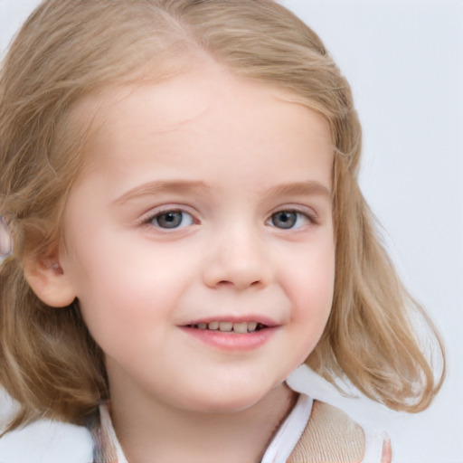 Joyful white child female with medium  blond hair and blue eyes