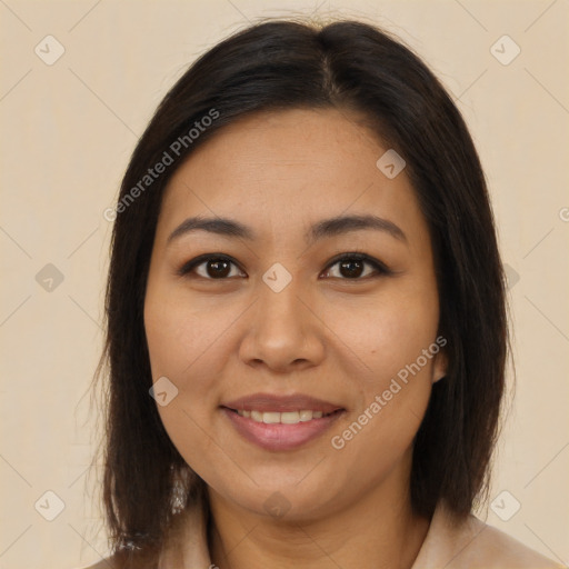 Joyful latino young-adult female with medium  brown hair and brown eyes