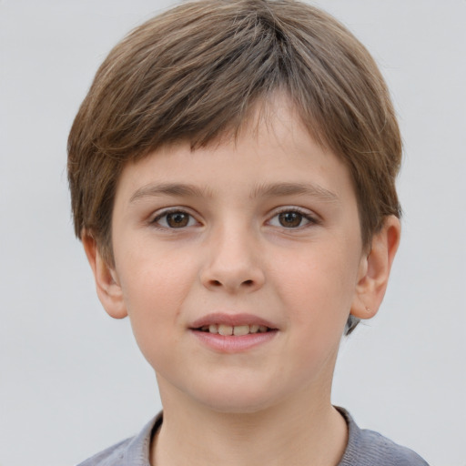 Joyful white child female with short  brown hair and grey eyes