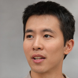 Neutral asian young-adult male with short  black hair and brown eyes