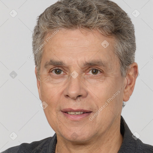 Joyful white middle-aged male with short  brown hair and brown eyes