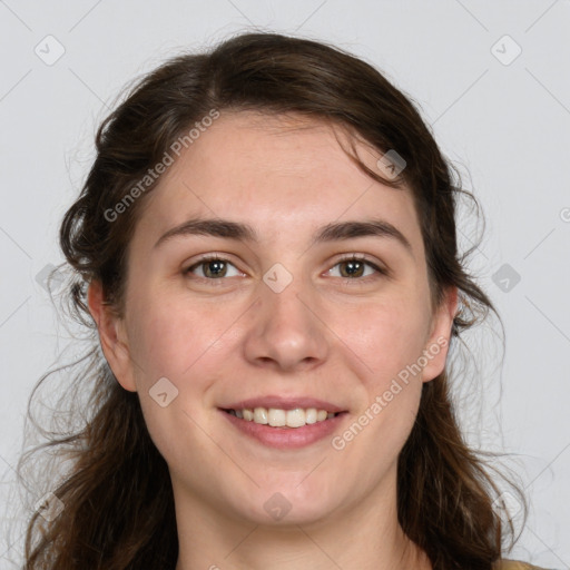 Joyful white young-adult female with medium  brown hair and green eyes