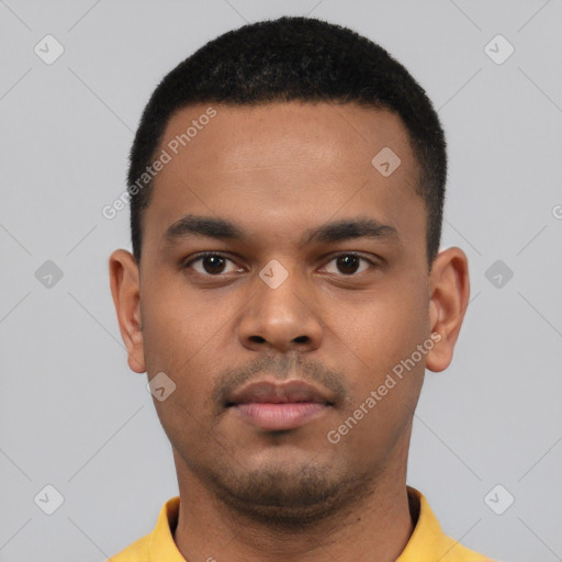 Neutral latino young-adult male with short  black hair and brown eyes