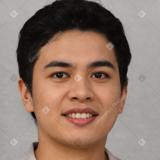 Joyful asian young-adult male with short  black hair and brown eyes