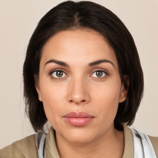 Neutral white young-adult female with medium  brown hair and brown eyes