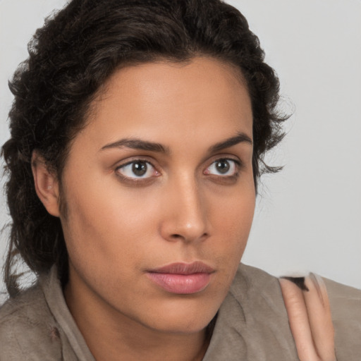 Neutral white young-adult female with short  brown hair and brown eyes