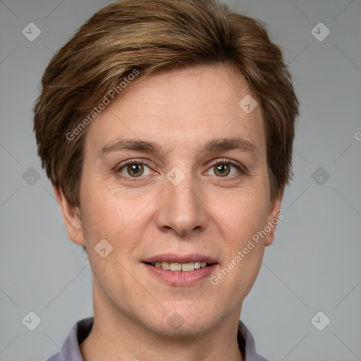 Joyful white adult female with short  brown hair and grey eyes