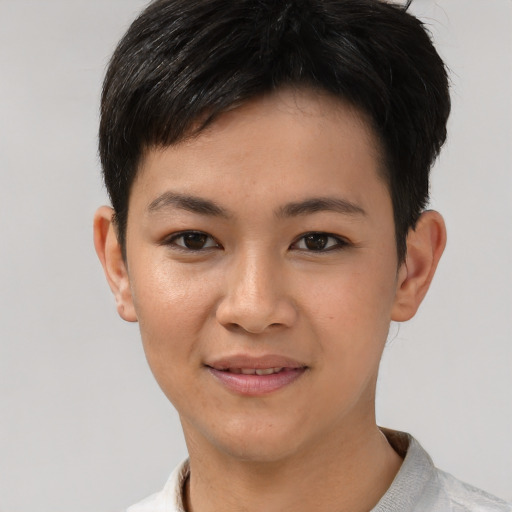 Joyful asian young-adult female with short  brown hair and brown eyes