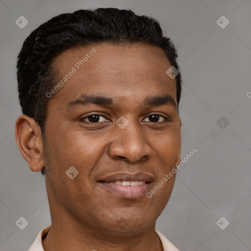 Joyful latino young-adult male with short  brown hair and brown eyes