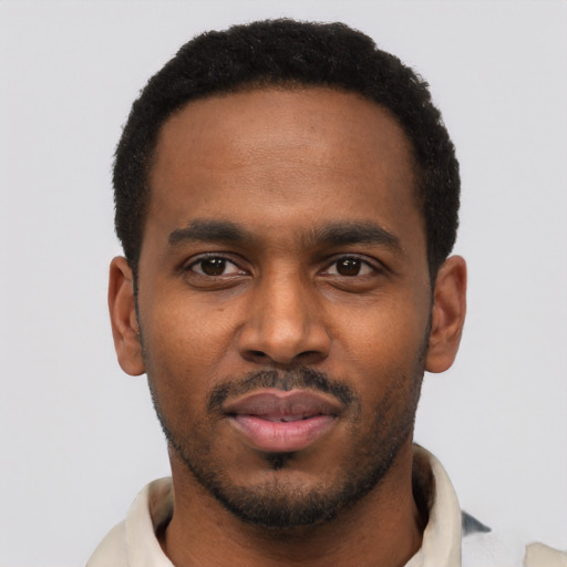 Neutral black young-adult male with short  black hair and brown eyes