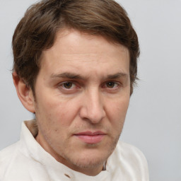 Neutral white adult male with short  brown hair and brown eyes