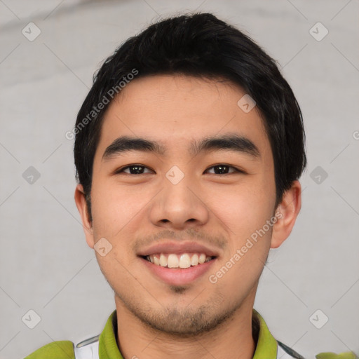 Joyful asian young-adult male with short  black hair and brown eyes